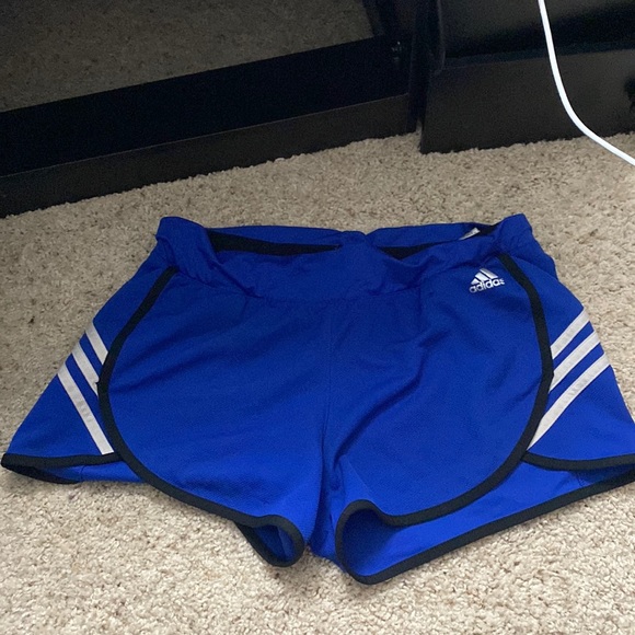blue with white striped adidas, athletic shorts. - Picture 1 of 3